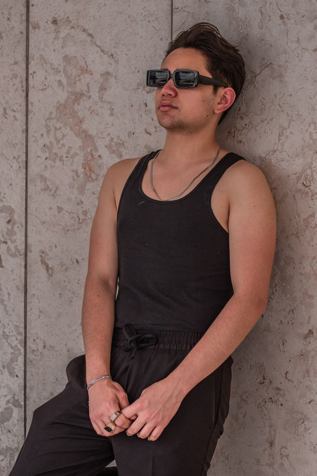 Black tank top with joggers, casual street style